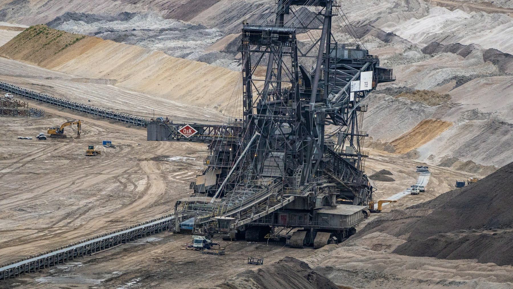 Open-pit mine with excavator